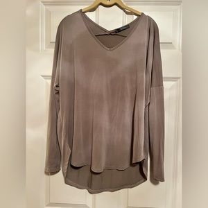 Taupe shirt with sliver embellishments on both arms